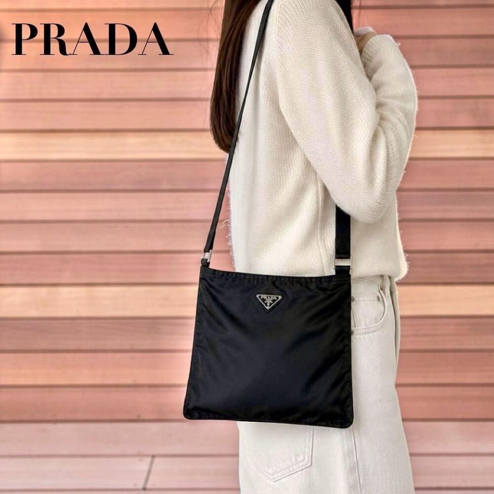 PRADA shoulder bag cross body triangular black white